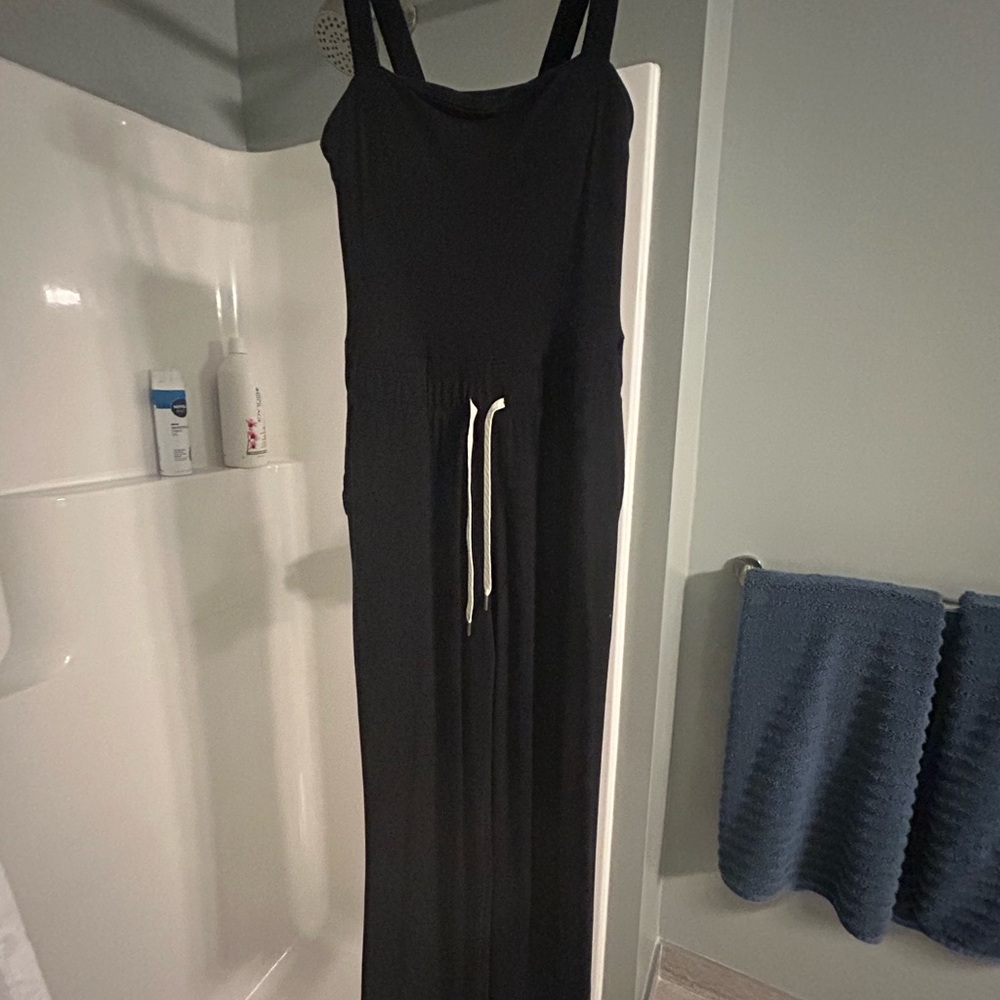 Size small Vuori jumpsuit, worn once. Poly blend, padded inserts.